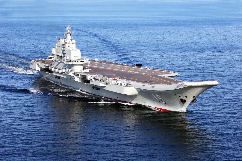 (121125) -- LIAONING AIRCRAFT CARRIER, Nov. 25, 2012 (Xinhua) --  This undated photo shows China's first aircraft carrier, the Liaoning, sailing on the sea. China has successfully conducted flight landing on its first aircraft carrier, the Liaoning. After its delivery to the People's Liberation Army (PLA) Navy on Sept. 25, the aircraft carrier has undergone a series of sailing and technological tests, including the flight of the carrier-borne J-15. Capabilities of the carrier platform and the J-15 have been tested, meeting all requirements and achieving good compatibility, the PLA Navy said. Designed by and made in China, the J-15 is able to carry multi-type anti-ship, air-to-air and air-to-ground missiles, as well as precision-guided bombs. The J-15 has comprehensive capabilities comparable to those of the Russian Su-33 jet and the U.S. F-18, military experts estimated.  (Xinhua/Zha Chunming)