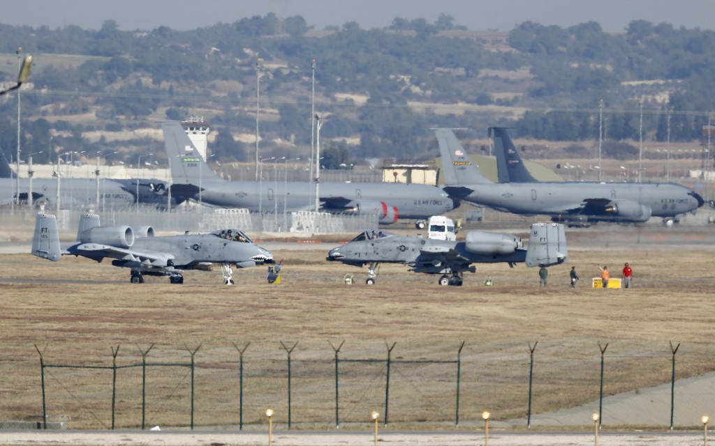 U.S. Air Force A-10 Thunderbolt II fighter jets (foreground) are pictured at Incirlik airbase in the southern city of Adana, Turkey, December 11, 2015. REUTERS/Umit Bektas