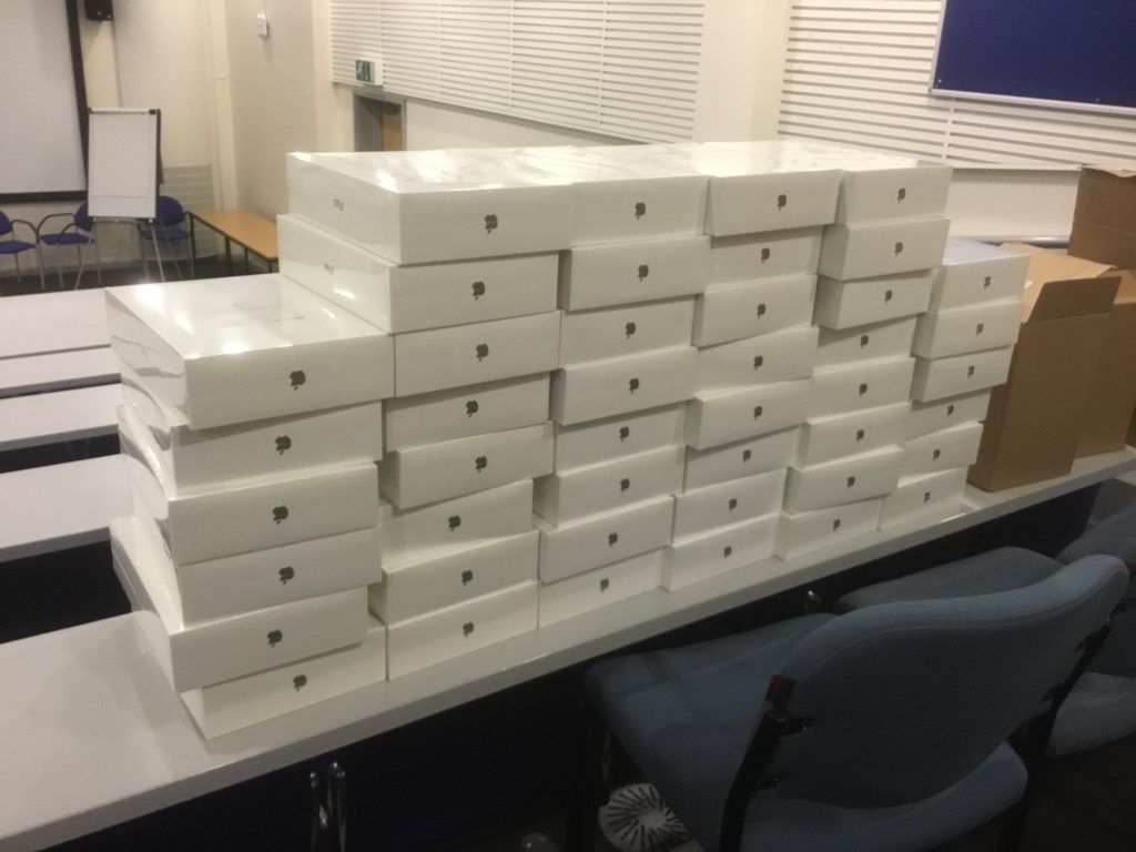 A number of iPads ready to be handed to students