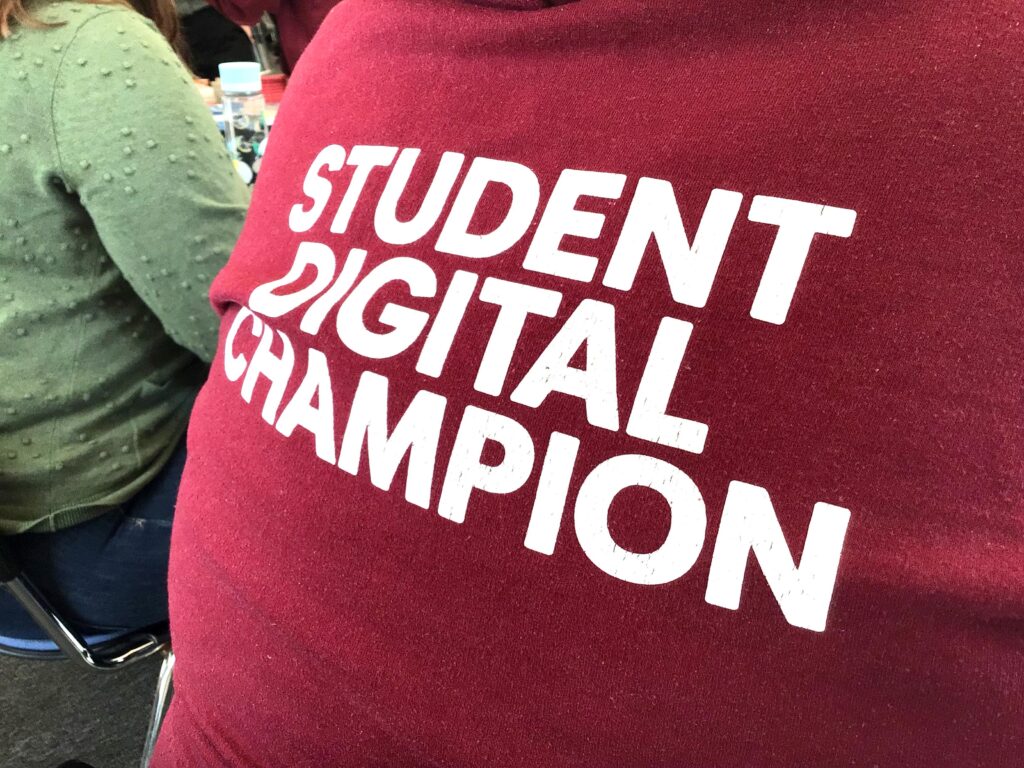 Student Digital Champion text on back of hoodie.